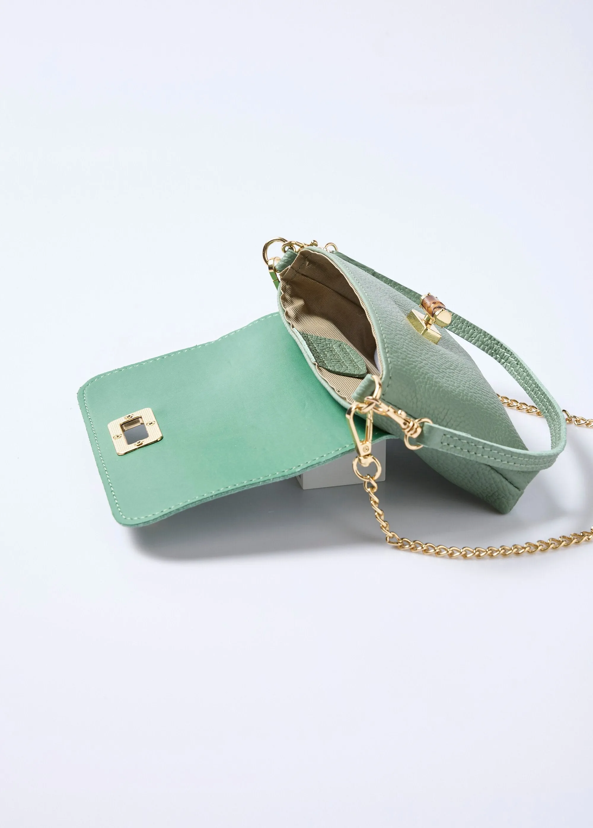 Leather clutch bag with metal clasp