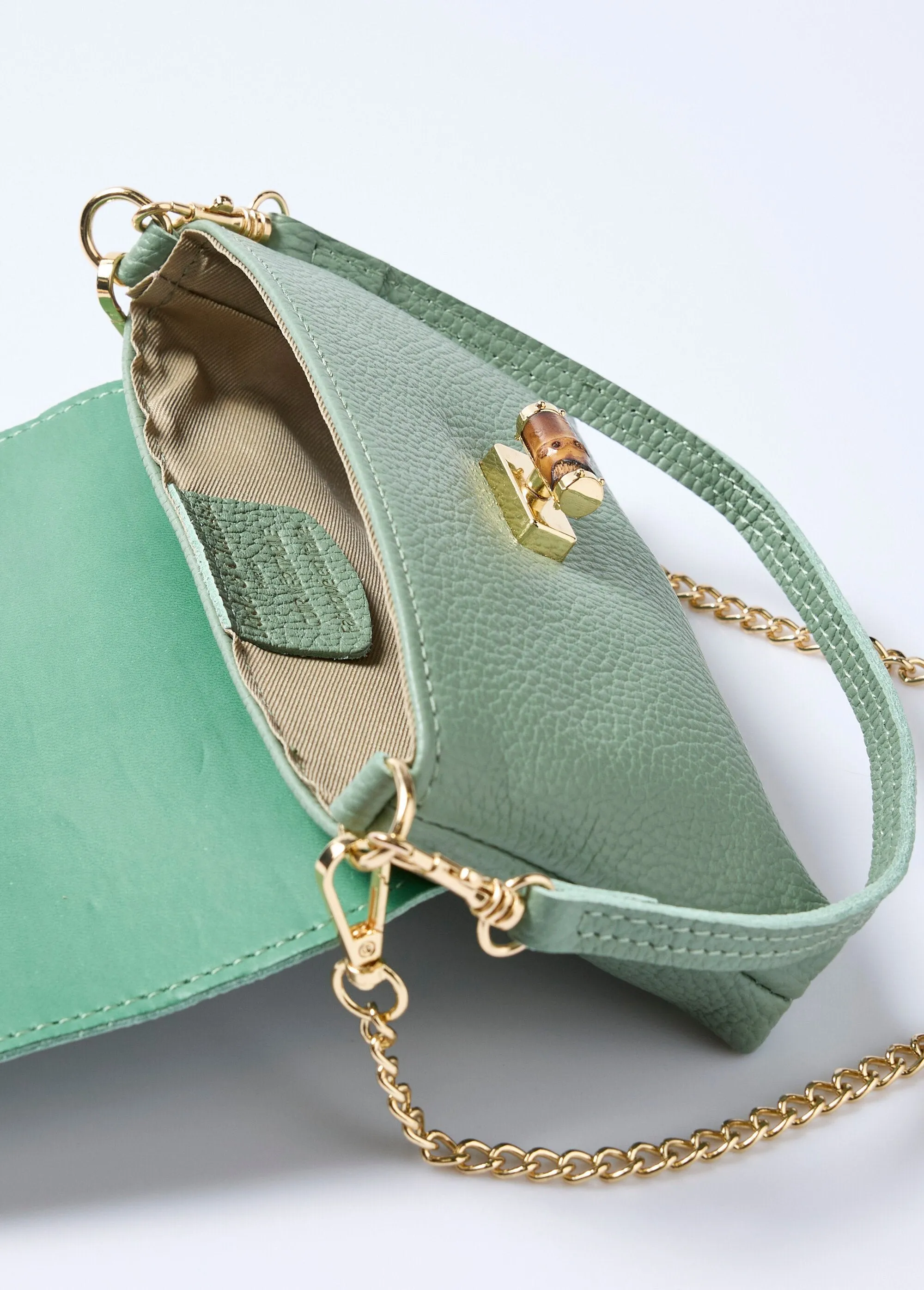 Leather clutch bag with metal clasp