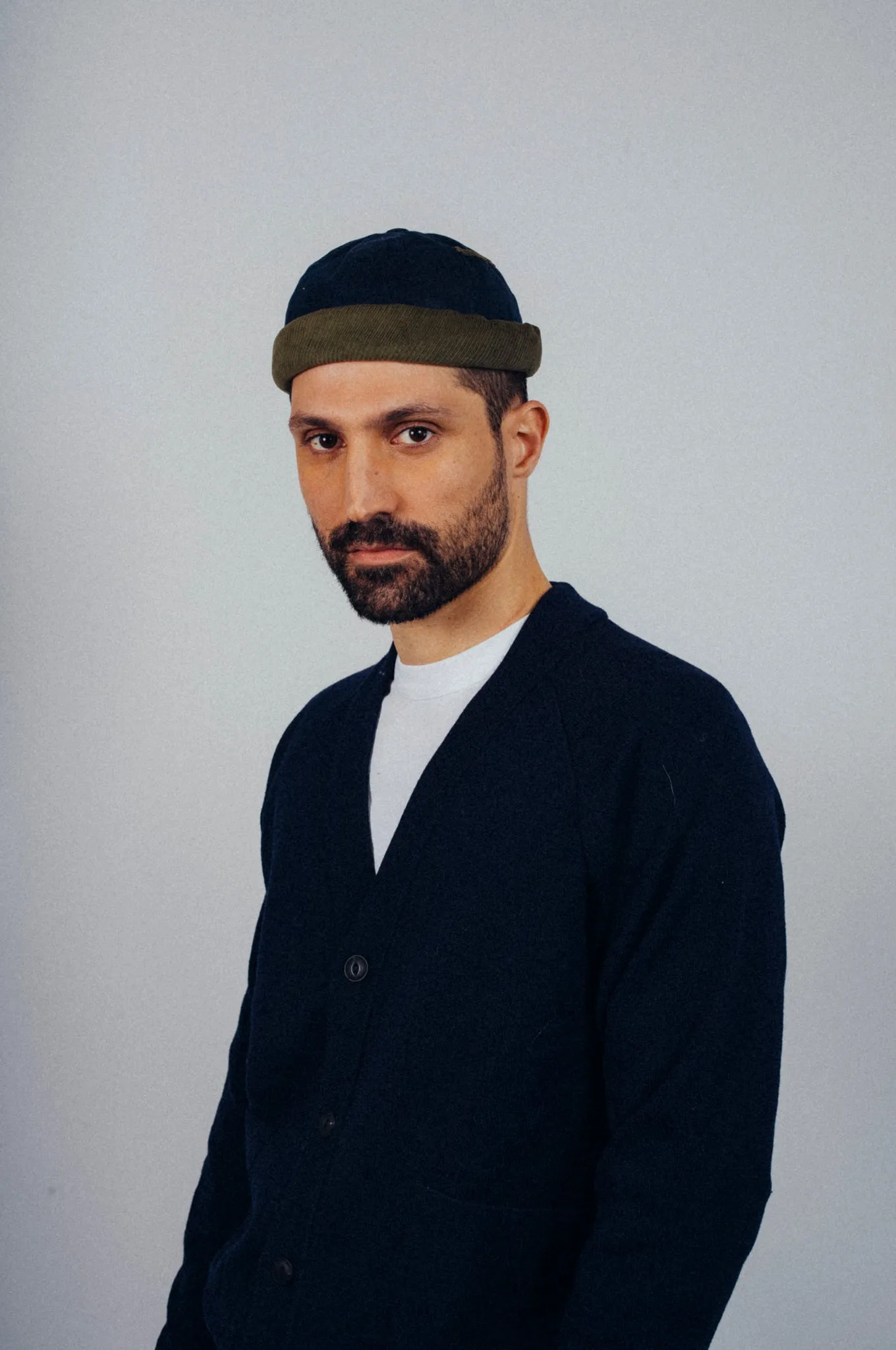 MIKI DOCKER HAT DARK BLUE WAXED COTTON AND GREEN VELVET