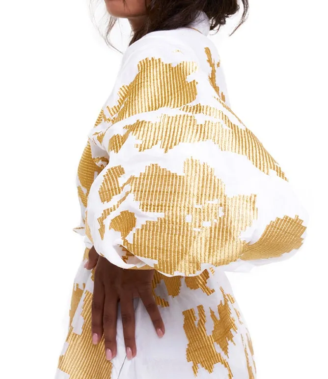 White dress with gold embroidery